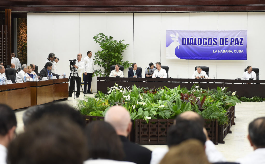 Colombia's peace talks with FARC's guerrilla group set for October 8, despite ongoing wave of violence in Cauca.